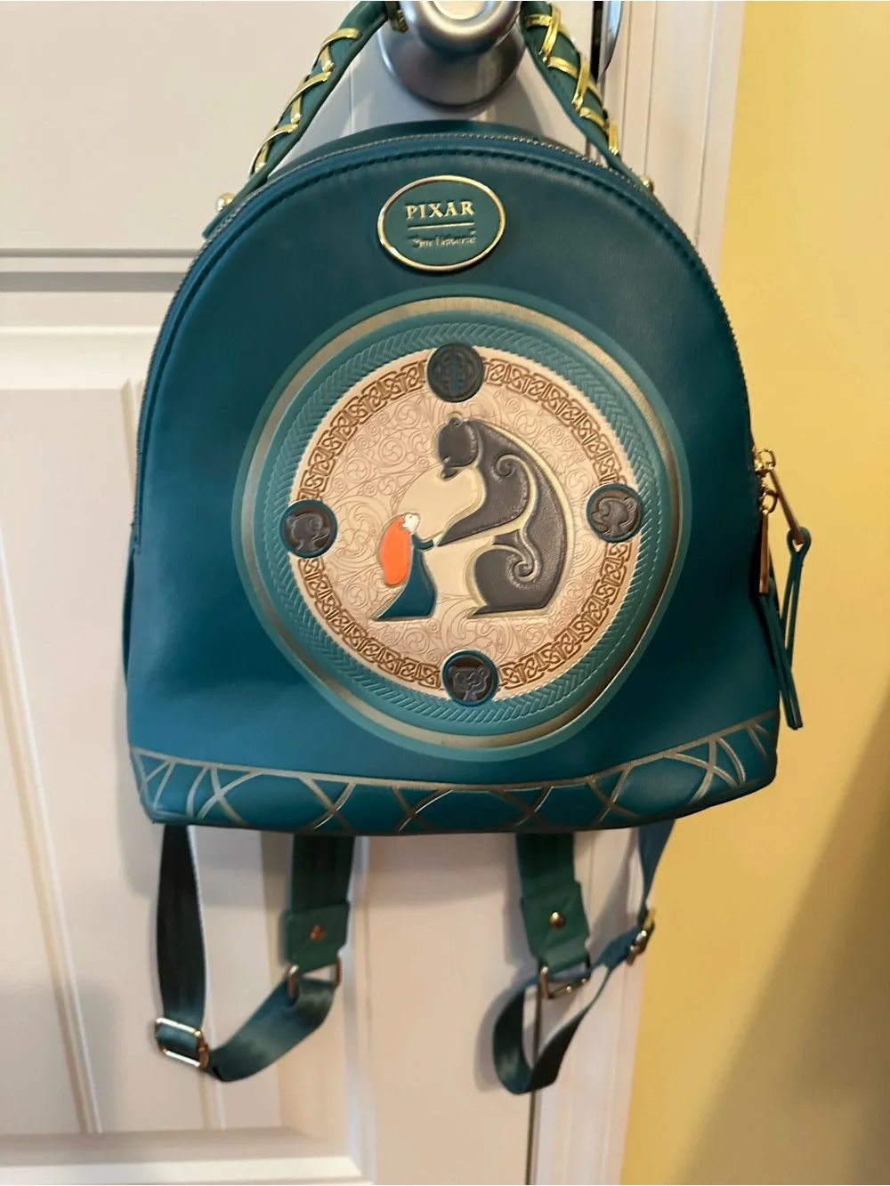 Our Universe Disney Pixar Brave DunBroch Family tapestry mini backpack.
